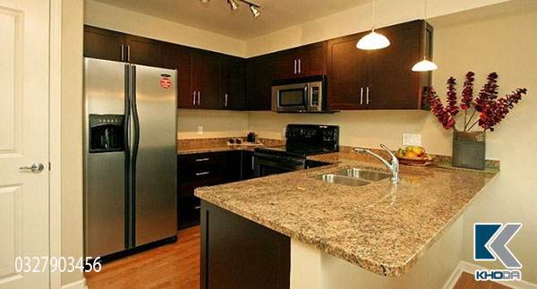 Đá ốp bàn bếp vàng sò